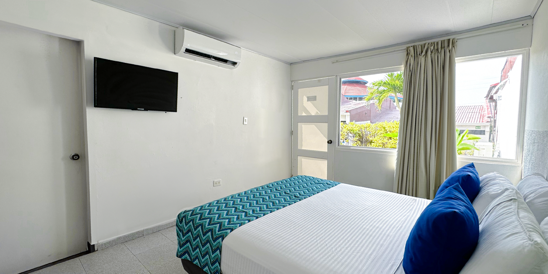 on-vacation-colombia-destino-nacional-san-andres-hotel-reef-cama-sencilla