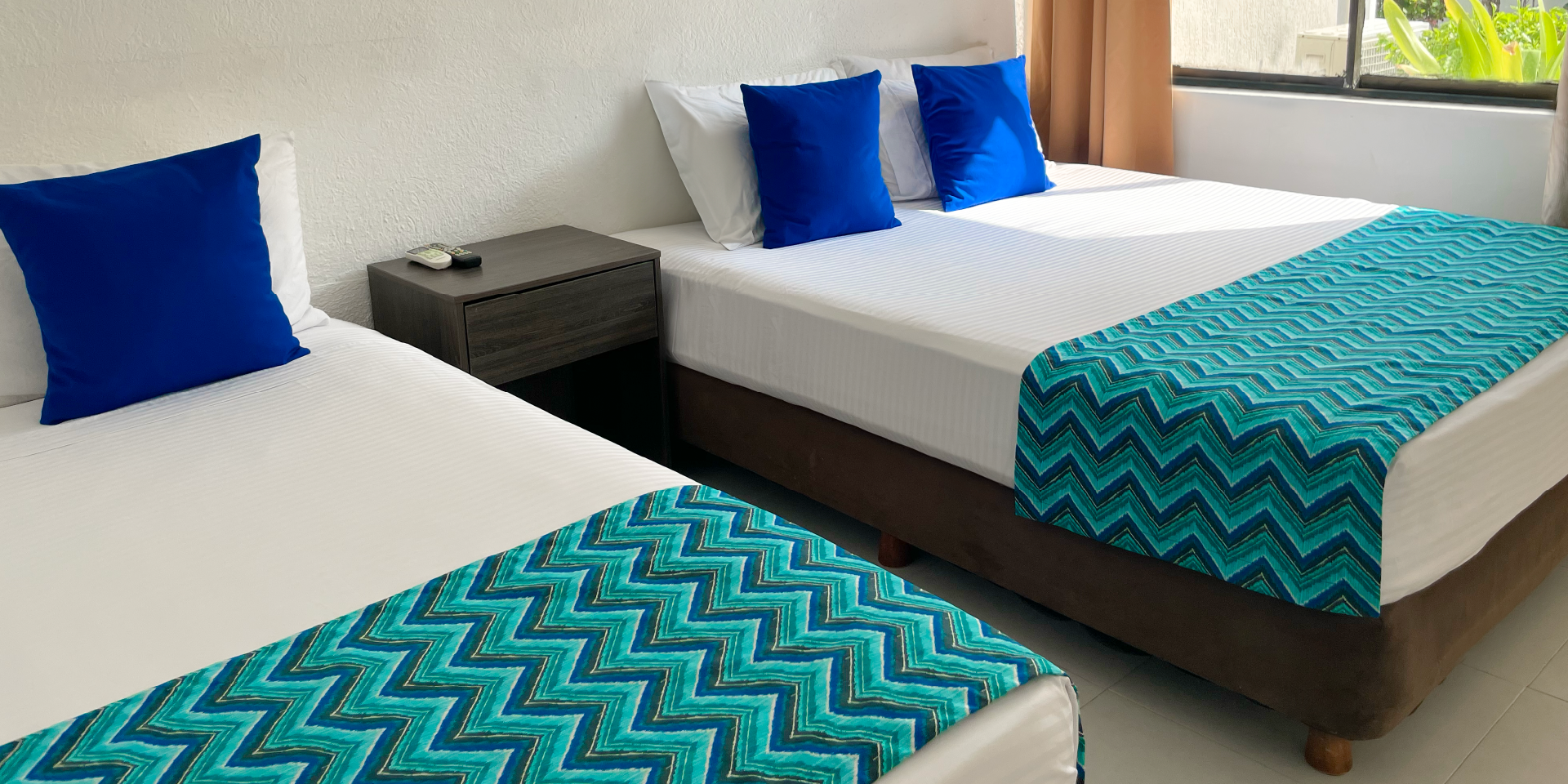 on-vacation-colombia-destino-nacional-san-andres-hotel-reef-camas-sencillas